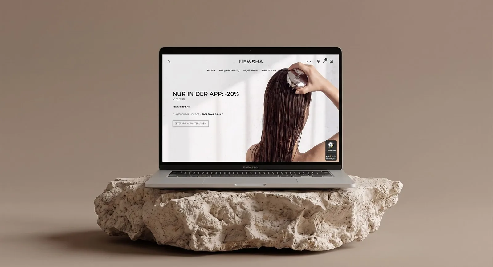 NEWSHA website shown on a laptop, styled mockup